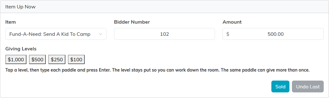The Item Up Now panel mid-entry: a Fund A Need item chosen, the 500 dollar level tapped, bidder number 102 typed and the amount filled in at 500 dollars, ready for Sold