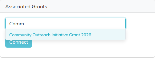 The Associated Grants panel with Comm typed in the search box and Community Outreach Initiative Grant 2026 offered in the list